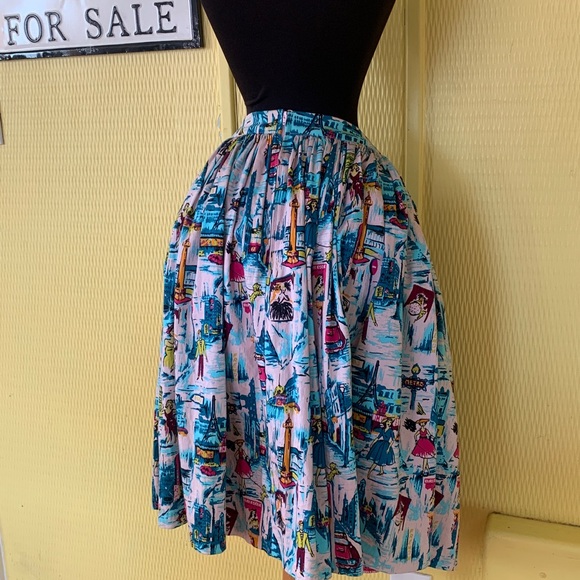 Pinup couture Jenny skirt with Paris print and POCKETS!
Size medium waist 30” - Picture 6 of 6